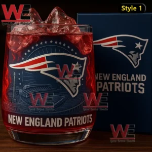New England Patriots Goat Legacy Whiskey Glass 6 A close up Patriots glass with red ice next to a dark blue team box!