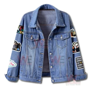 New Kids On The Block Las Vegas Residency Denim Jacket 4 Front view of a blue denim jacket with button details chest pockets and decorative music themed patches on the sleeves!