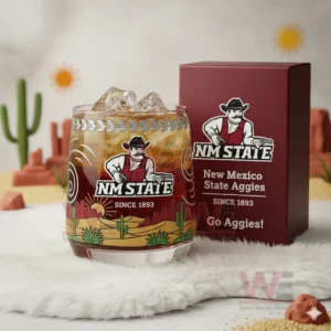 New Mexico State Aggies glass with iced drink displayed indoors with desert themed background!