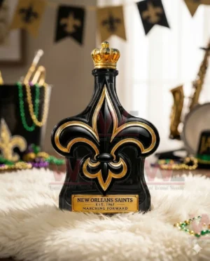 New Orleans Saints fleur de lis whiskey bottle with crown stopper displayed on a white fur rug with festive team decor in the background!
