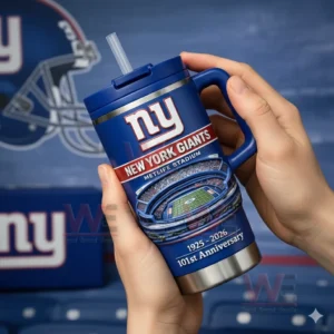 Close up of a blue New York Giants insulated tumbler with handle and straw featuring the ny logo MetLife Stadium illustration and 101st anniversary text.