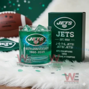 New York Jets anniversary glass with green iced drink beside a dark green box showing team logo and championship information!