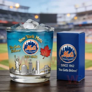 New York Mets themed whiskey glass with blue drink ice cubes and decorative city design next to a branded collector box!