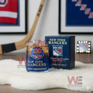 New York Rangers anniversary glass with amber iced drink beside a dark blue box showing team logo and Madison Square Garden details!