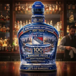 New York Rangers Pride 100Th Anniversary 1926-2026 Lets Go Rangers Whiskey Bottle 4 New York Rangers anniversary bottle on a wooden bar counter with softly lit bottles in the background!