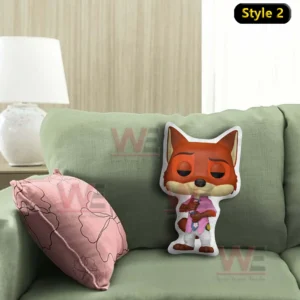 Fox character pillow in a pink shirt standing on a green sofa!