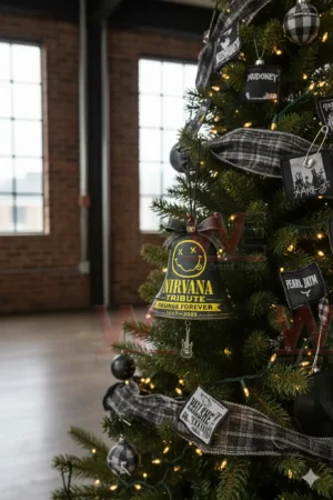 Rock tribute bell ornament hanging on a decorated tree in an indoor setting!
