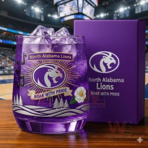 North Alabama Lions branded glass with purple iced drink positioned inside a basketball arena setting!
