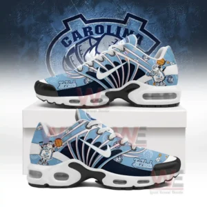 Blue and navy Tar Heels shoes with mascot graphics displayed on a box before the team emblem!