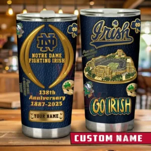 Pair of Notre Dame Fighting Irish custom name tumblers in navy and gold featuring stadium art Irish script and 138th anniversary 1887 to 2025 design on a wooden table!