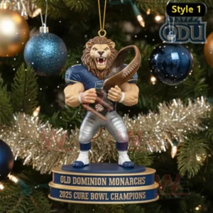 Old Dominion Monarchs lion mascot Christmas ornament holding a trophy on a champions base hanging on a decorated tree.