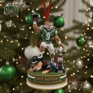 Ohio Bobcats football mascot ornament celebrating a bowl championship displayed on a Christmas tree with glowing lights and green decorations!