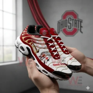 Hands holding Ohio State inspired sneakers with red uppers white panels gold accents and detailed artwork on the sides!