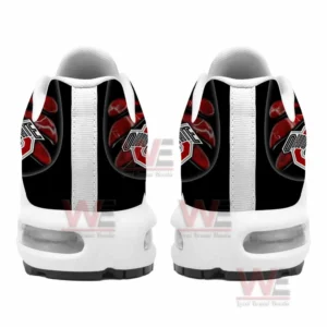 Back view of black and white athletic shoes with structured heel design!