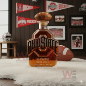 A Buckeyes anniversary bottle sits on a fluffy white rug surrounded by team banners helmets and sports photos!