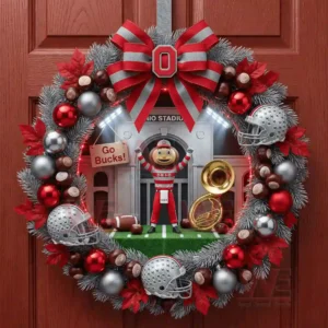 A holiday wreath on a wooden door showcasing team colors a mascot figure football themed decorations and a stadium scene!