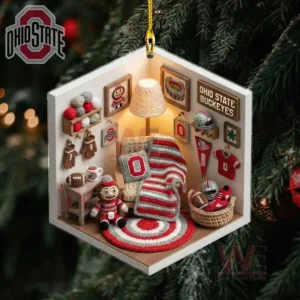 A detailed Ohio State themed mini room ornament featuring tiny furniture crafts and team symbols hanging among Christmas tree branches!