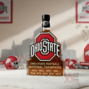 Ohio State football championship bottle with black cap displayed among team themed decorations.