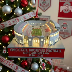 Ohio Statee Buckeyes Football 135th Anniversary Stadium Ornament 5 A close up of a detailed Ohio State Buckeyes football stadium ornament with bright lights hanging on a decorated Christmas tree indoors!