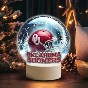 Snowy themed decorative globe with an Oklahoma Sooners helmet on a white stand!