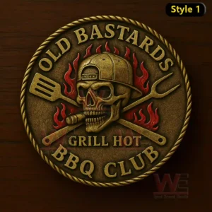 A circular coin with a skull cap grilling tools and flames representing a BBQ club emblem!