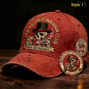 Red baseball cap with embroidered skull holding bourbon glass and smoking styled with vintage club themed design on a wooden background!