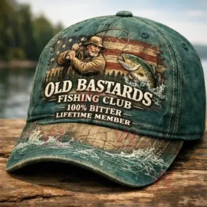 Green vintage fishing cap with illustrated fisherman and fish design displayed outdoors!