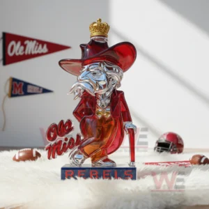 Ole Miss Rebels Colonel Reb Custom Whiskey Bottle 6 A crown topped Rebels bottle stands on a fluffy rug with helmets pennants and sports items in the background!