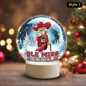 Illuminated glass sphere with classic Ole Miss Rebels mascot against a snowy background on a white base!
