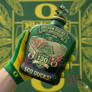 Green Oregon Ducks anniversary bottle with stadium artwork and duck mascot lid held in a yellow and green glove in front of a team logo background!