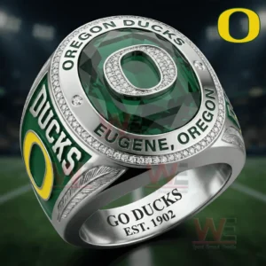 Oregon Ducks ring with green gemstone face and raised O emblem with green and yellow side details.
