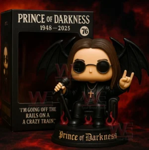 Gothic music themed figure with black wings round glasses and a microphone posed on a decorative base!