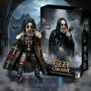 Building block rock themed figure with long dark hair round sunglasses microphone and bat themed prop standing beside a gothic collector box with bats fog and Prince Of Darkness Edition title!