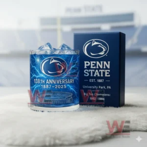 A blue Penn State themed glass with ice next to a matching box shown on a soft white surface with a stadium background!