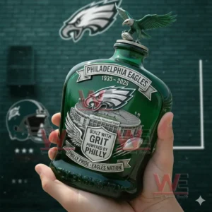 Green football themed commemorative bottle with eagle topper held in front of a team styled background!