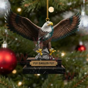 Eagle ornament with spread wings green Eagles sash and Fly Eagles Fly base displayed on a Christmas tree!