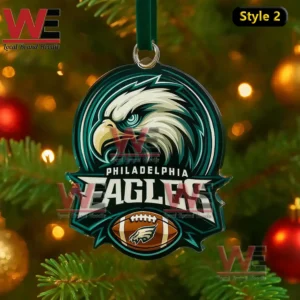 Philadelphia Eagles round Christmas ornament with eagle logo hanging on a festive tree!