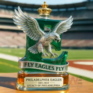 Philadelphia Eagles themed whiskey bottle with silver eagle wings crown top and green glass design placed in a stadium setting!