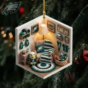 A detailed Eagles themed mini room ornament featuring small furniture crafts and team symbols hanging among Christmas tree branches!