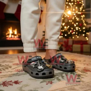 Pierce the Veil Christmas Crocs Crocband Clogs with Charms 5 Person wearing decorated clogs with themed charms standing on a holiday rug near a fireplace and Christmas tree!