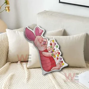 Piglet Winnie The Pooh Christmas Custom Shaped Pillow 5 Pink pig character christmas pillow leaning on a beige sofa with soft cushions!