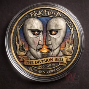 Close up of a Pink Floyd Division Bell commemorative coin with twin face design and guitars on a dark background!