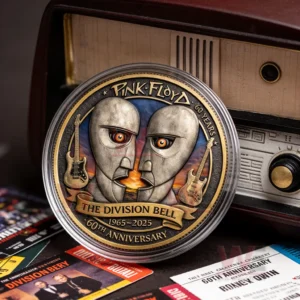 Pink Floyd Division Bell anniversary coin displayed next to a vintage radio and music memorabilia on a table!