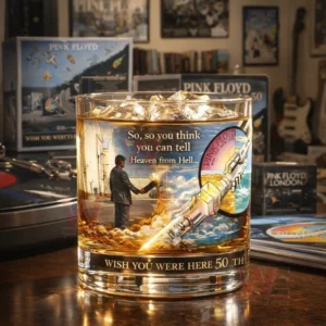Decorative whisky glass with Pink Floyd artwork sitting among vinyl records and music themed decor!