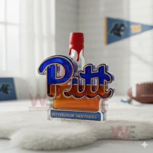 Pittsburgh Panthers Hail To Pitt Custom Whiskey Bottle 4 A Pitt logo bottle with a red wax cap on white fur with helmets footballs and banners nearby.