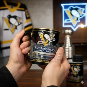 Person holding a Pittsburgh Penguins anniversary mug with logo skyline and 59th anniversary 1967 to 2026 text with jersey and neon sign in background!