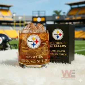 Whiskey glass with Steelers logo amber drink and ice cubes positioned in front of a football stadium scene!