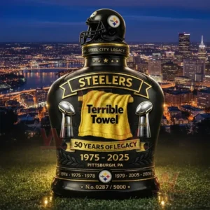 Steelers Terrible Towel fifty years legacy black and gold whiskey bottle with helmet topper and trophy details shown with a Pittsburgh night skyline background!