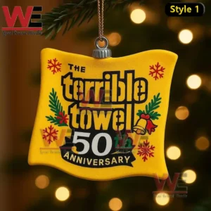 Yellow terrible towel themed Christmas ornament hanging on a decorated tree with glowing lights!
