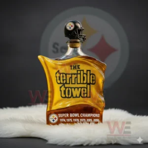 A yellow Terrible Towel bottle with a Steelers helmet cap placed on white fur with a dark background.